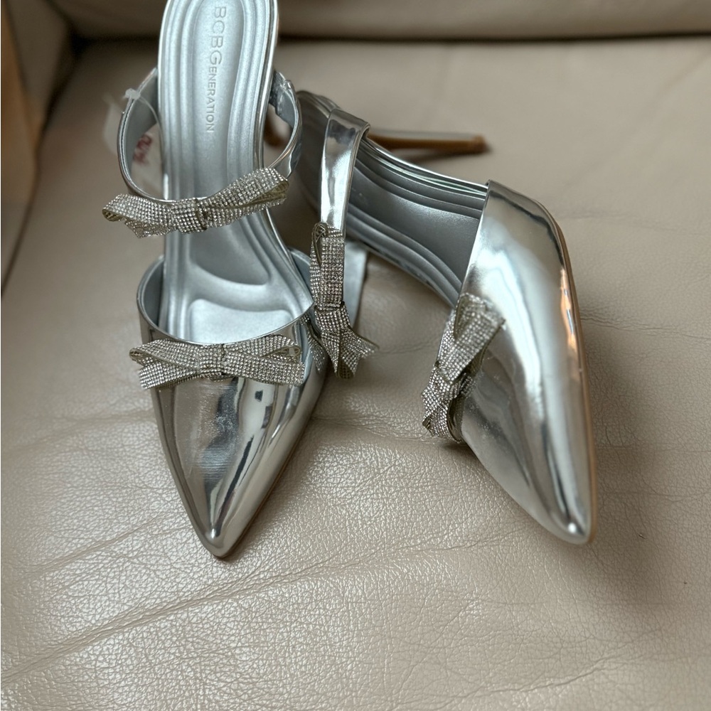 BCBGeneration Metallic Silver Heels with Bow Accents